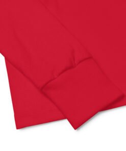 Gros plan sur les poignets côtelés du T-shirt rouge manches longues Patch et Coco – Les Chiens Pirates.
